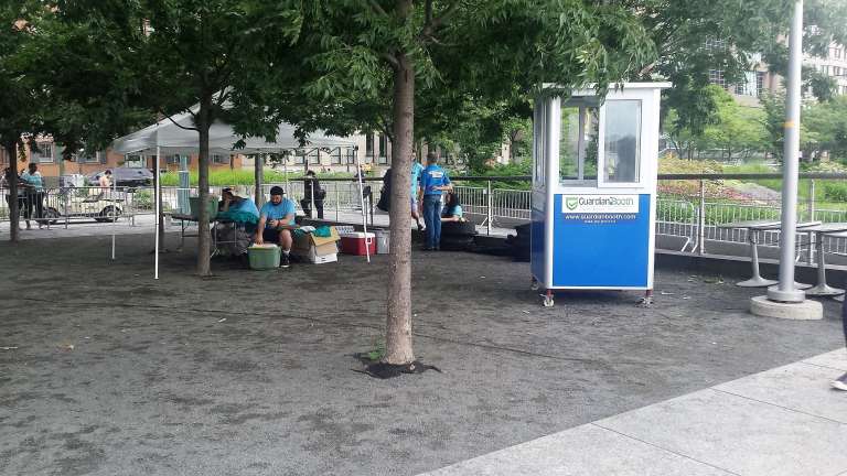 4×4 Cashier Booth in NYC outside Pride Parade, with Caster Wheels, Built-in AC, Swing Door and Flashing Light