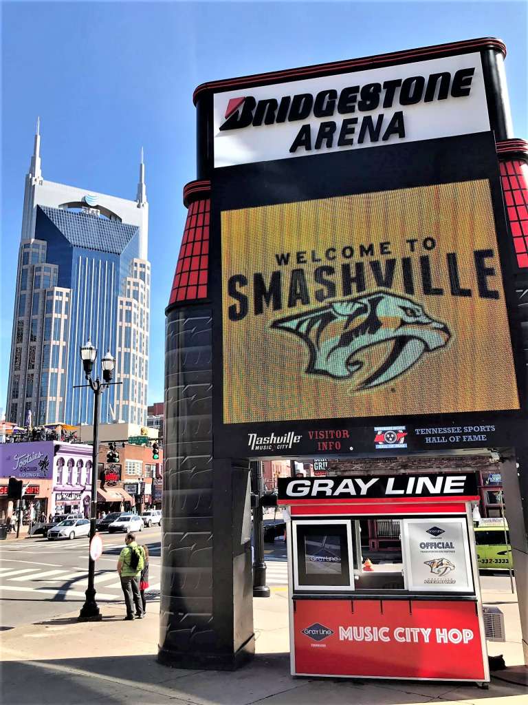 6×8 Ticket Booth in Nashville, TN with Custom Graphics, Custom Exterior Color, Outside Spotlights, and Sliding Windows